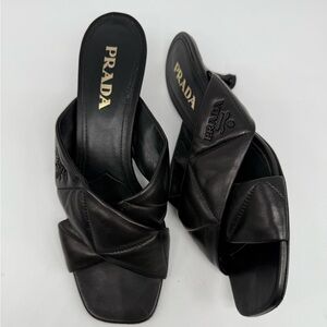 Prada Black leather quilted criss cross logo embellished kitten heel mules EU 41